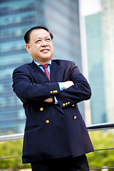 Image showing Asian businessman smiling portrait