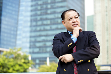 Image showing Asian businessman smiling portrait