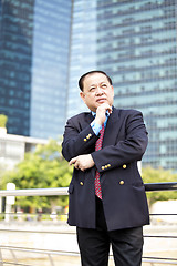 Image showing Asian businessman smiling portrait