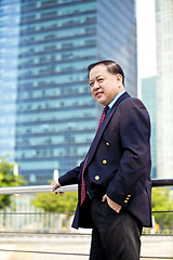 Image showing Asian businessman smiling portrait