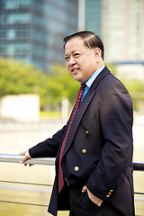 Image showing Asian businessman smiling portrait