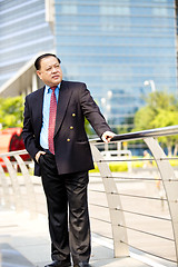 Image showing Asian businessman smiling portrait