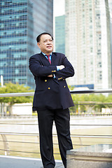 Image showing Asian businessman smiling portrait