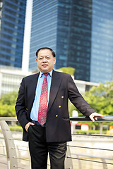 Image showing Asian businessman smiling portrait