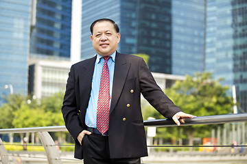 Image showing Asian businessman smiling portrait