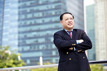 Image showing Asian businessman smiling portrait