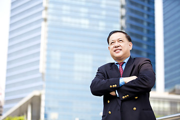 Image showing Asian businessman smiling portrait