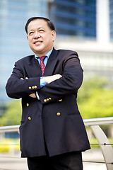 Image showing Asian businessman smiling portrait