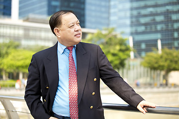 Image showing Asian businessman smiling portrait