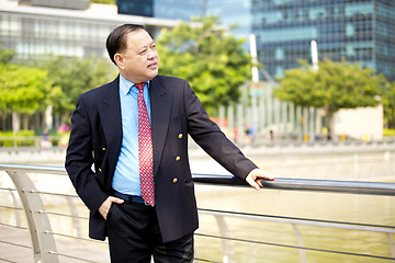 Image showing Asian businessman smiling portrait