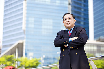 Image showing Asian businessman smiling portrait