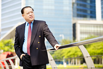 Image showing Asian businessman smiling portrait