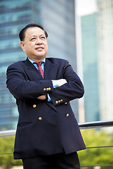 Image showing Asian businessman smiling portrait