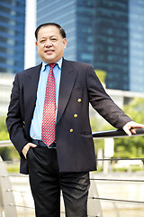 Image showing Asian businessman smiling portrait