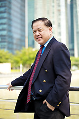 Image showing Asian businessman smiling portrait