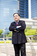 Image showing Asian businessman smiling portrait