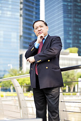 Image showing Asian businessman smiling portrait
