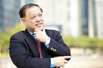 Image showing Asian businessman smiling portrait