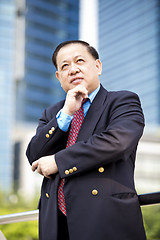 Image showing Asian businessman smiling portrait