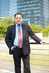 Image showing Asian businessman smiling portrait