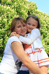 Image showing mother and daughter embrace