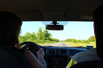 Image showing Young woman driving the car