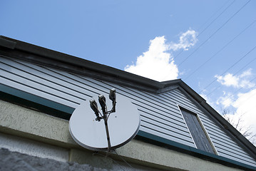 Image showing satellite dish on the house