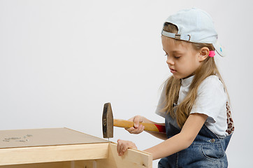 Image showing Child washes rear wall of the chest