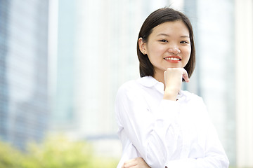 Image showing Asian young female executive smiling portrait