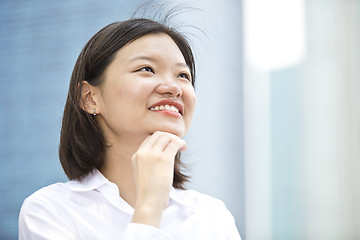 Image showing Asian young female executive smiling portrait