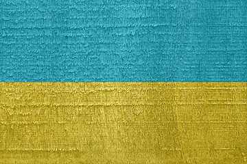 Image showing Flag of Ukraine on old dried wood texture