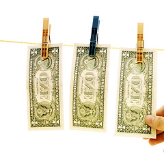 Image showing Dollars on the wire