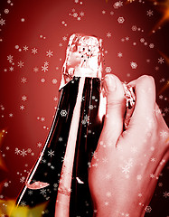 Image showing Opening champagne bottle