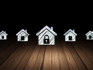 Image showing Security concept:  home icon in grunge dark room