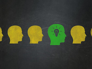 Image showing Business concept: green head with light bulb icon on School Board background