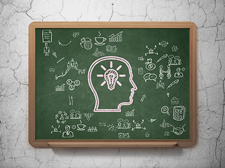 Image showing Finance concept: Head With Lightbulb on School Board background