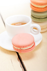 Image showing colorful macaroons with espresso coffee 