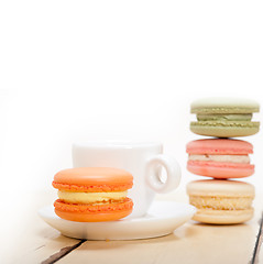 Image showing colorful macaroons with espresso coffee 