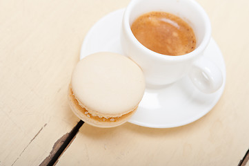 Image showing colorful macaroons with espresso coffee 