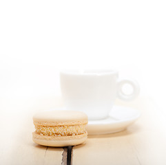 Image showing colorful macaroons with espresso coffee 