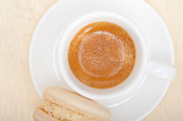 Image showing colorful macaroons with espresso coffee 