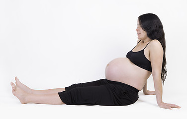 Image showing pregnant woman sitting