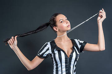 Image showing Attractive Soccer Referee holding whistle