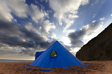 Image showing Conical tent on summer beach in evening