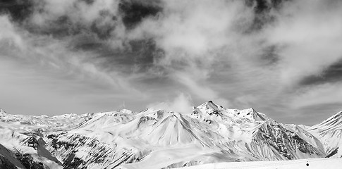 Image showing Black and white snowy mountains at wind day