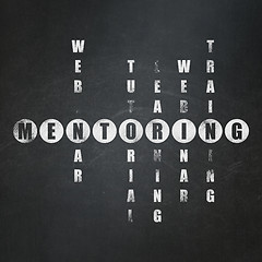 Image showing Education concept: word Mentoring in solving Crossword Puzzle