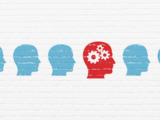 Image showing Education concept: red head with gears icon on wall background