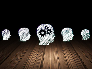 Image showing Education concept:  head with gears icon in grunge dark room