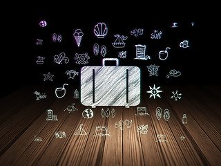 Image showing Travel concept: Bag in grunge dark room