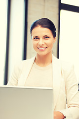 Image showing happy woman with laptop computer